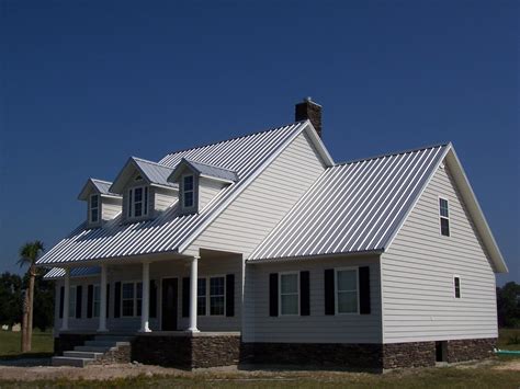 white house with galvanized metal roof|residential white metal roof.